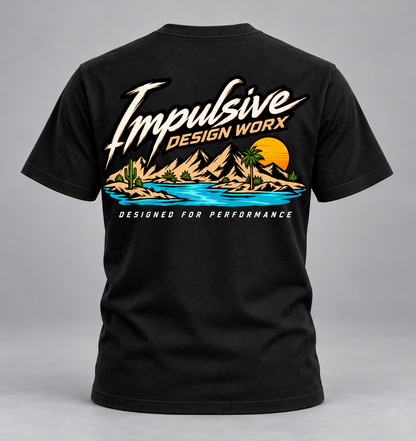 Back of a black IDW River Life T-shirt with mountains, palm trees, and water artwork